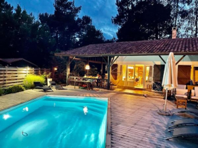 Villa landaise de charme avec piscine chauffée
